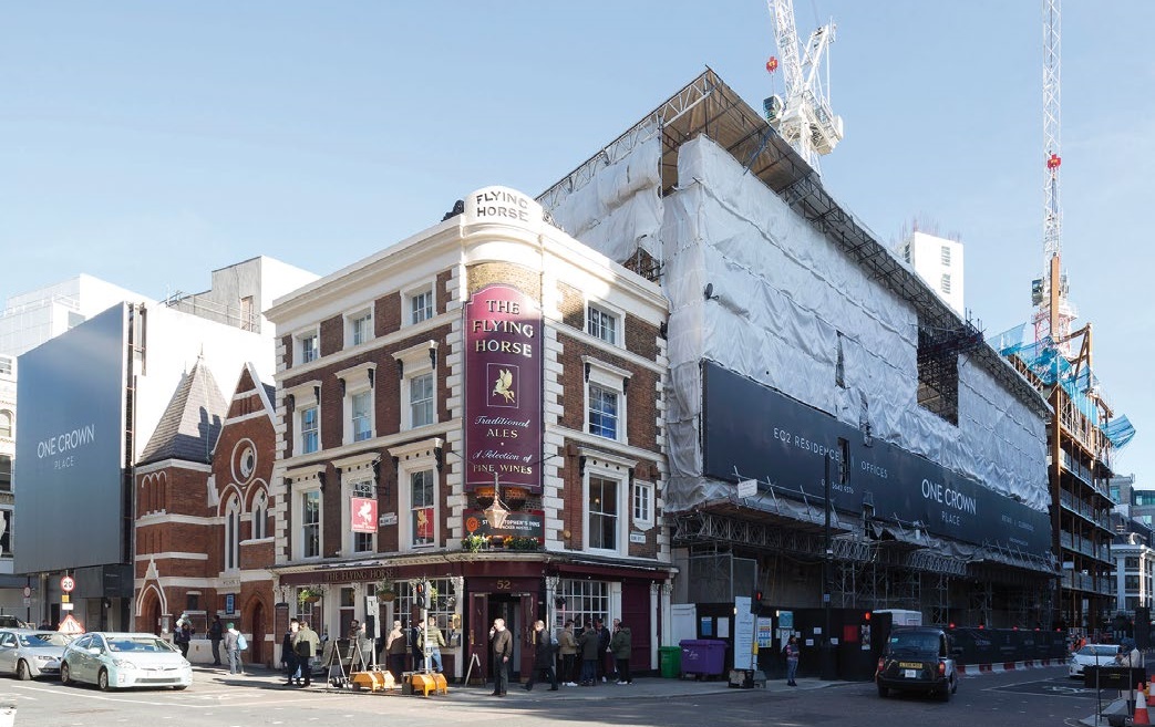 The overall project includes a number of retained elements including a pub and a Georgian fa&#231;ade (under wraps)