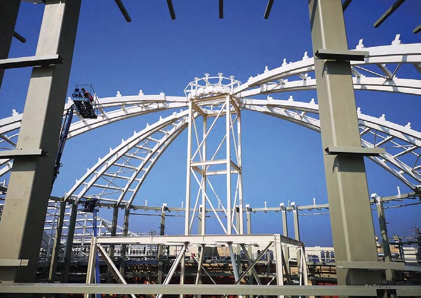 A temporary prop supports the dome during steel erection