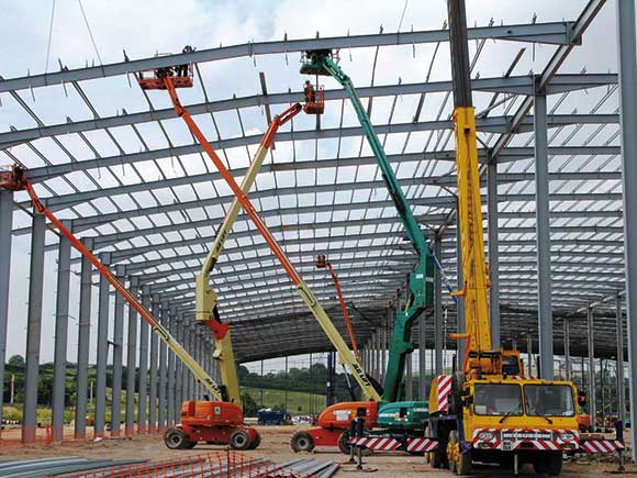 The large portal frame was erected in a traditional manner with cherry pickers and mobile cranes