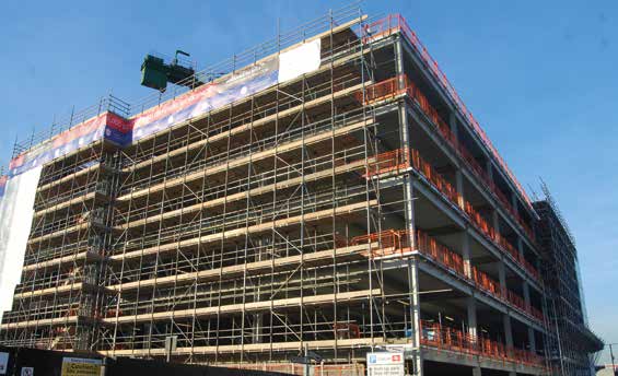 Scaffolding has been erected to allow the installation of the cladding system