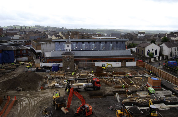The new indoor market hall and the retained clock tower