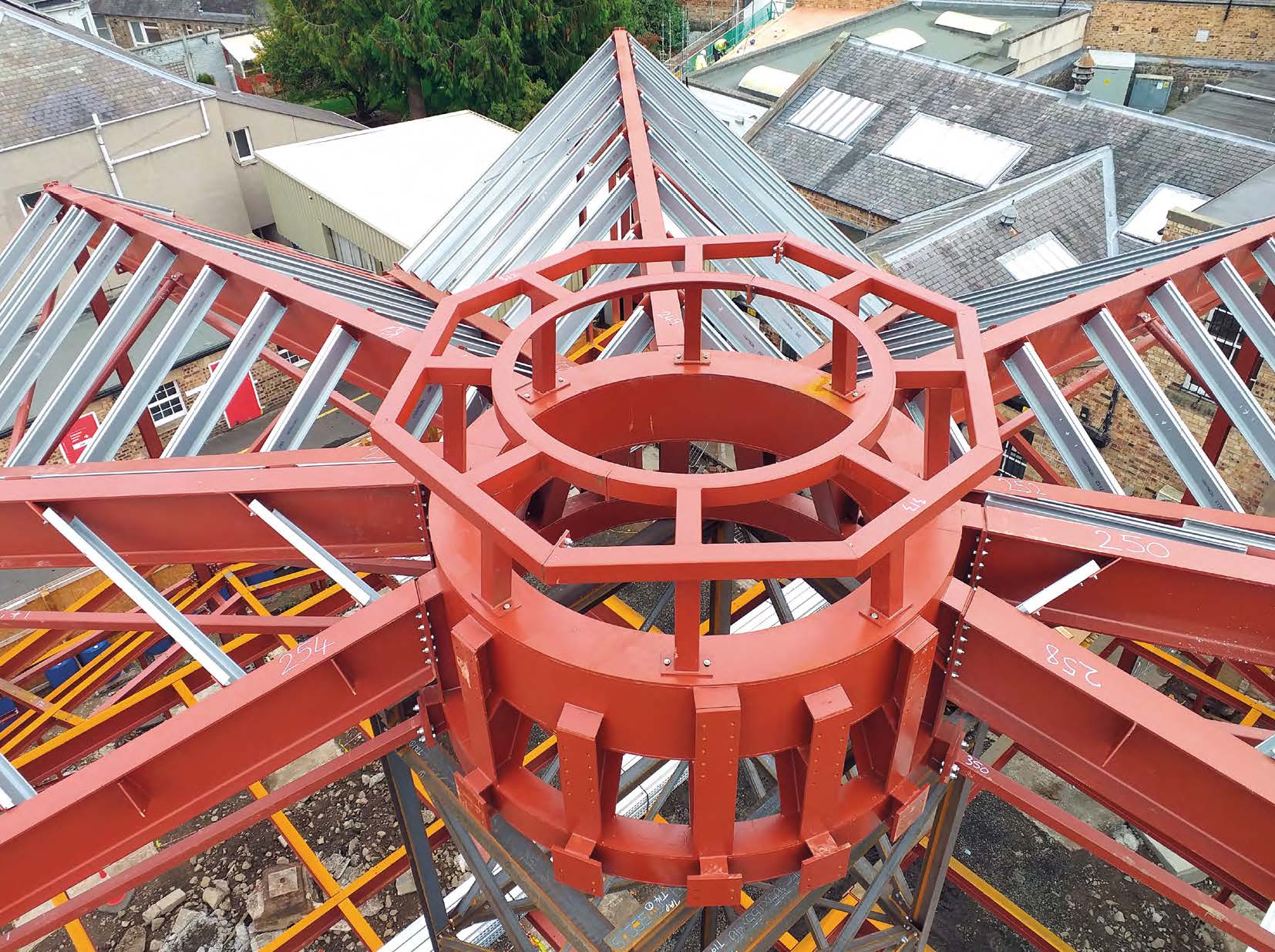 The origami-style roof radiates out from a central ring beam