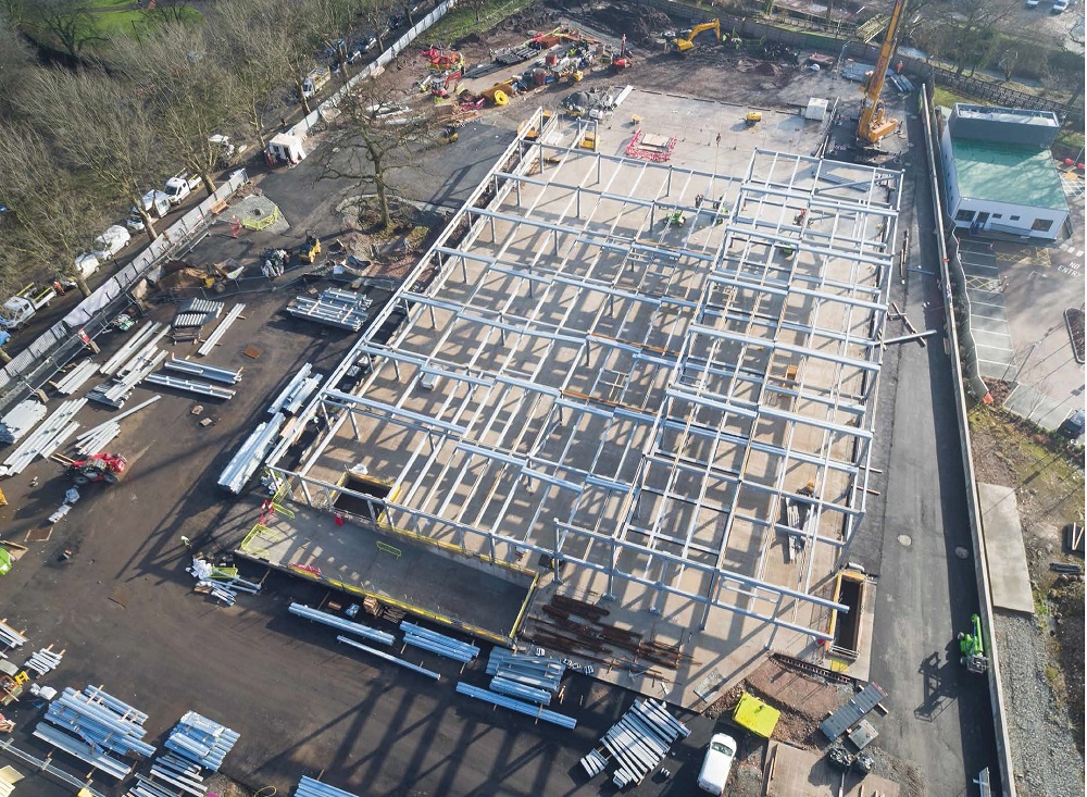 The main block sits atop a car park podium